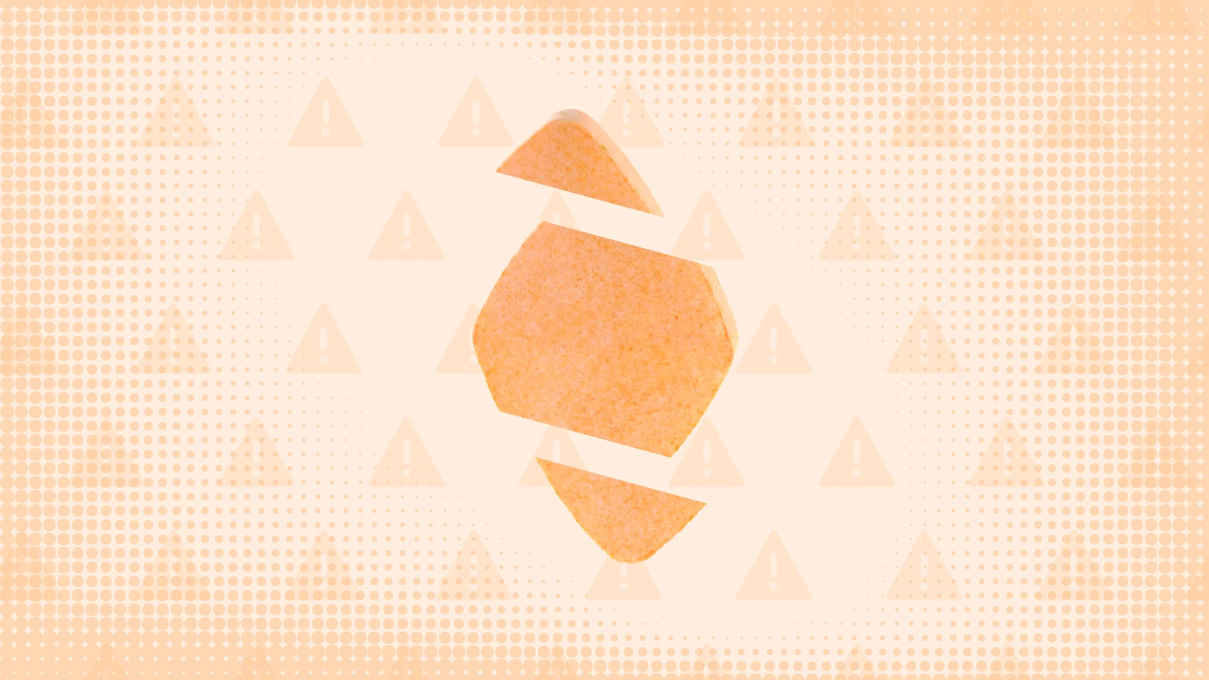 In the center of an orange background with texture and warning sign pattern is a diamond-shaped orange pill cut into thirds. 