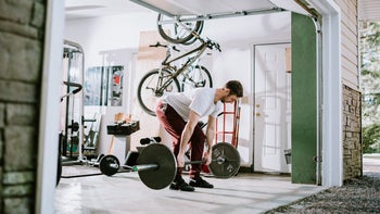 movement-exercise: man doing deadlift exercise 1219265873