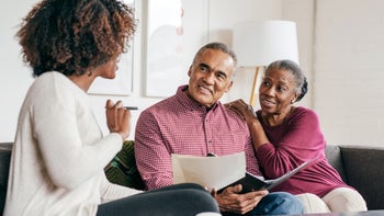 End-of-life: senior couple receiving advice 1053987352