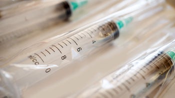 Health: Substance use disorder: closeup packaged syringe needles 943792418