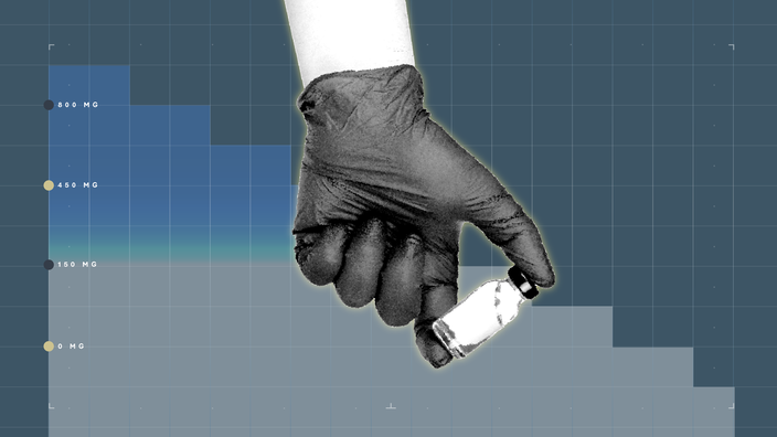 A graphic includes a blue graph-paper background and a black-and-white cutout of a hand holding a medication vial.