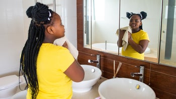 dermatology: preteen washing her face 1256664121