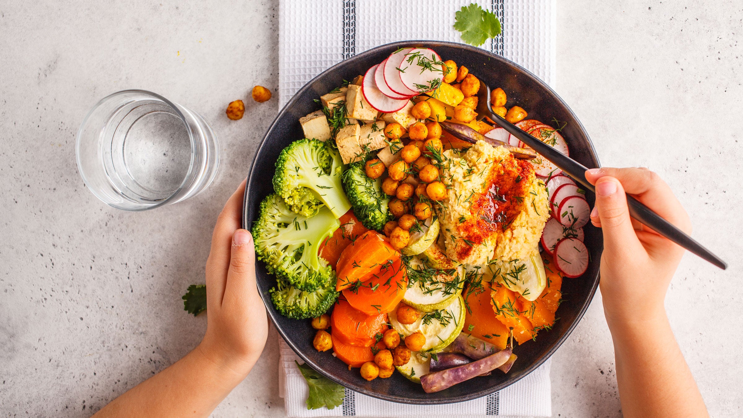 Health: Diet and nutrition: chickpea hummus bowl with greens 1053208202