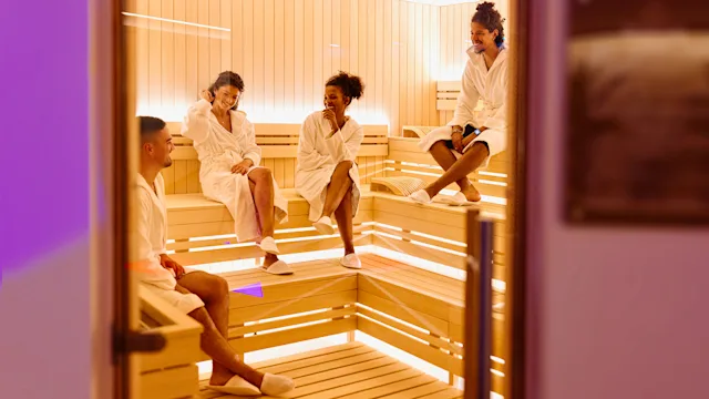alternative-treatments: people relaxing inside infrared sauna 1809393246