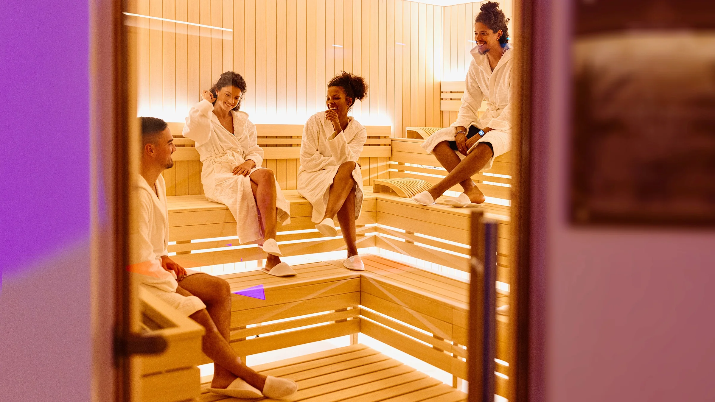 People relaxing inside an infrared sauna