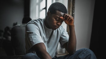 Supplements and herbs: man experiencing fatigue 2007584849