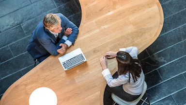 business-conversation-from-above-493797310