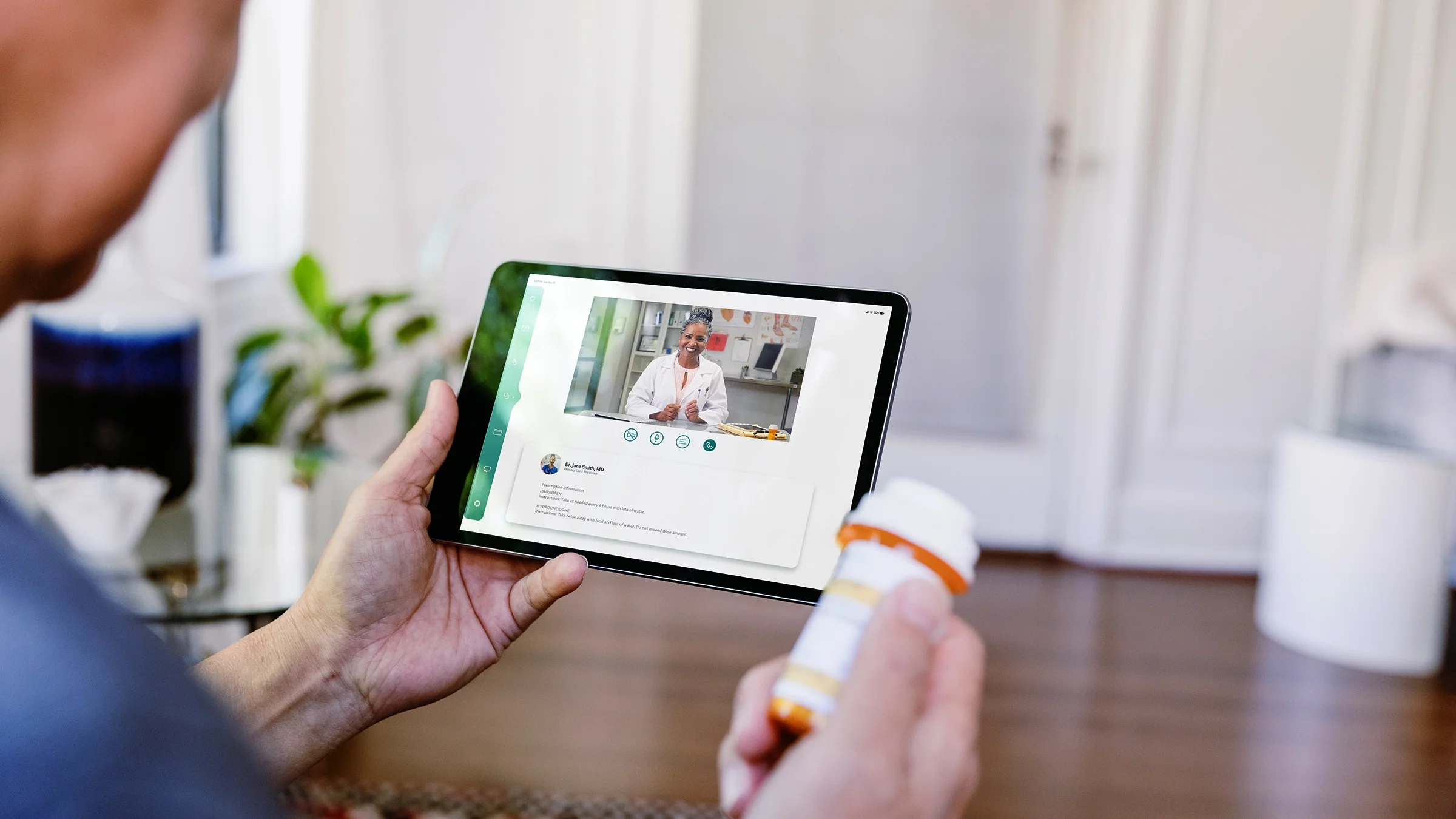A man discusses his medication with his doctor during a virtual appointment.