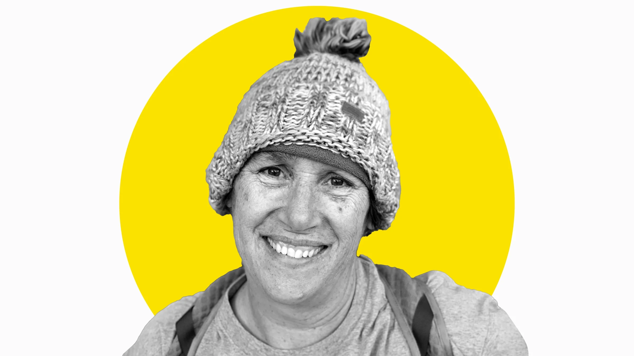 Rebecca Denison is pictured, outdoors wearing a hat.