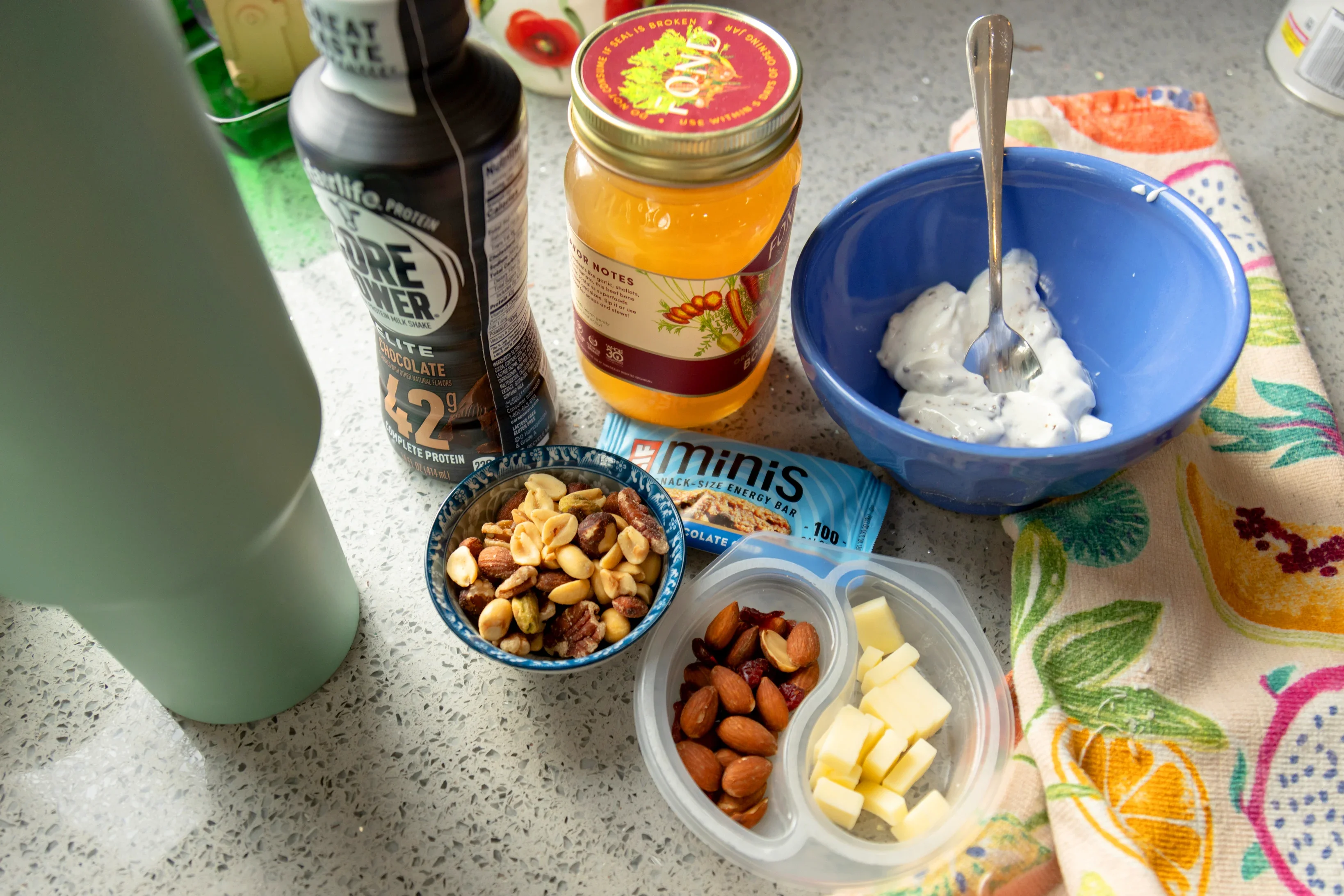 The high-protein snacks that keep Larisa Courtien full throughout the day are pictured in a close-up.