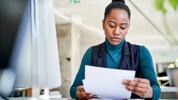 fsa-hsa: woman doing paperwork 2185971748