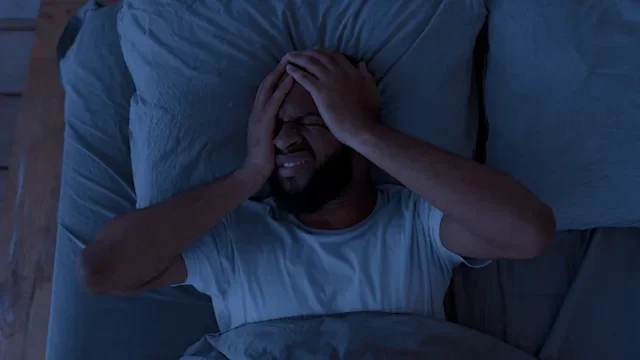 orexin-receptor-antagonists: man with migraine at night 1347867018