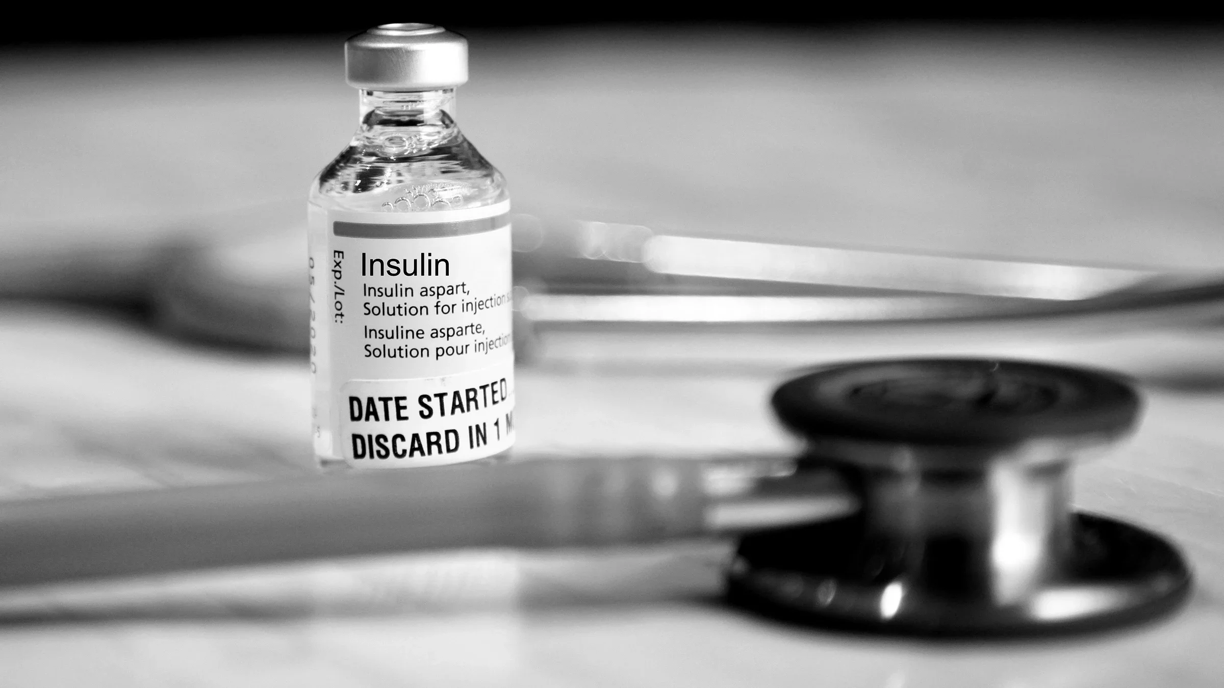 Health: Insulins: insulin bottle and stethoscope-1130140623