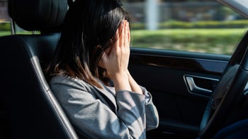 Social anxiety disorder: Shy or introverted: hiding-face-in-car-1337857903