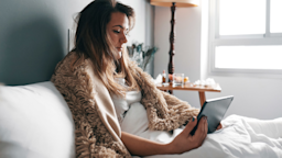 A sick person calling their doctor.
Sabalete/iStock via Getty Images Plus 