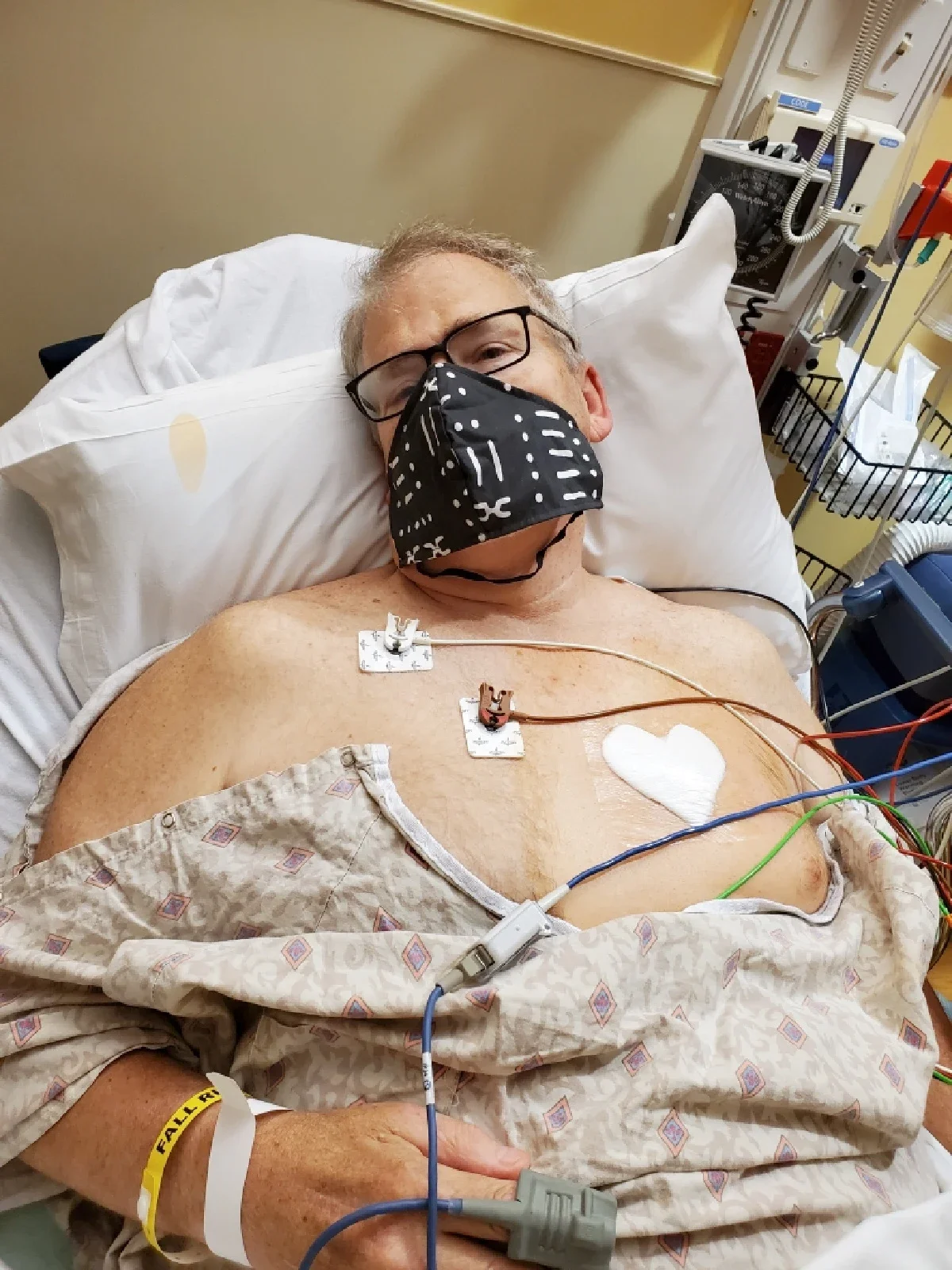 Jim Kuhn is pictured in a hospital bed.