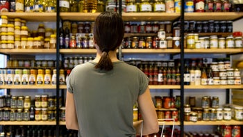 Diet Nutrition: woman buying spices at groecery store 1438530734