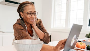 Health: Diet and nutrition: woman looking up a recipe 1215821310