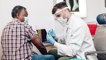 Health: Shingles: older man getting injection from provider 1311297745