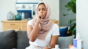 respiratory: woman with hiccups 1325074920