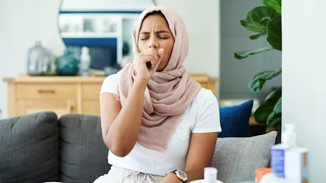 respiratory: woman with hiccups 1325074920