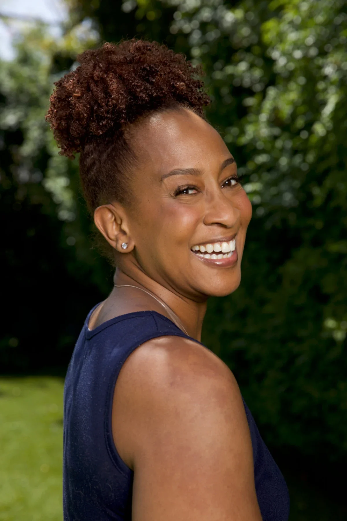 Crystal Arthur is pictured laughing.