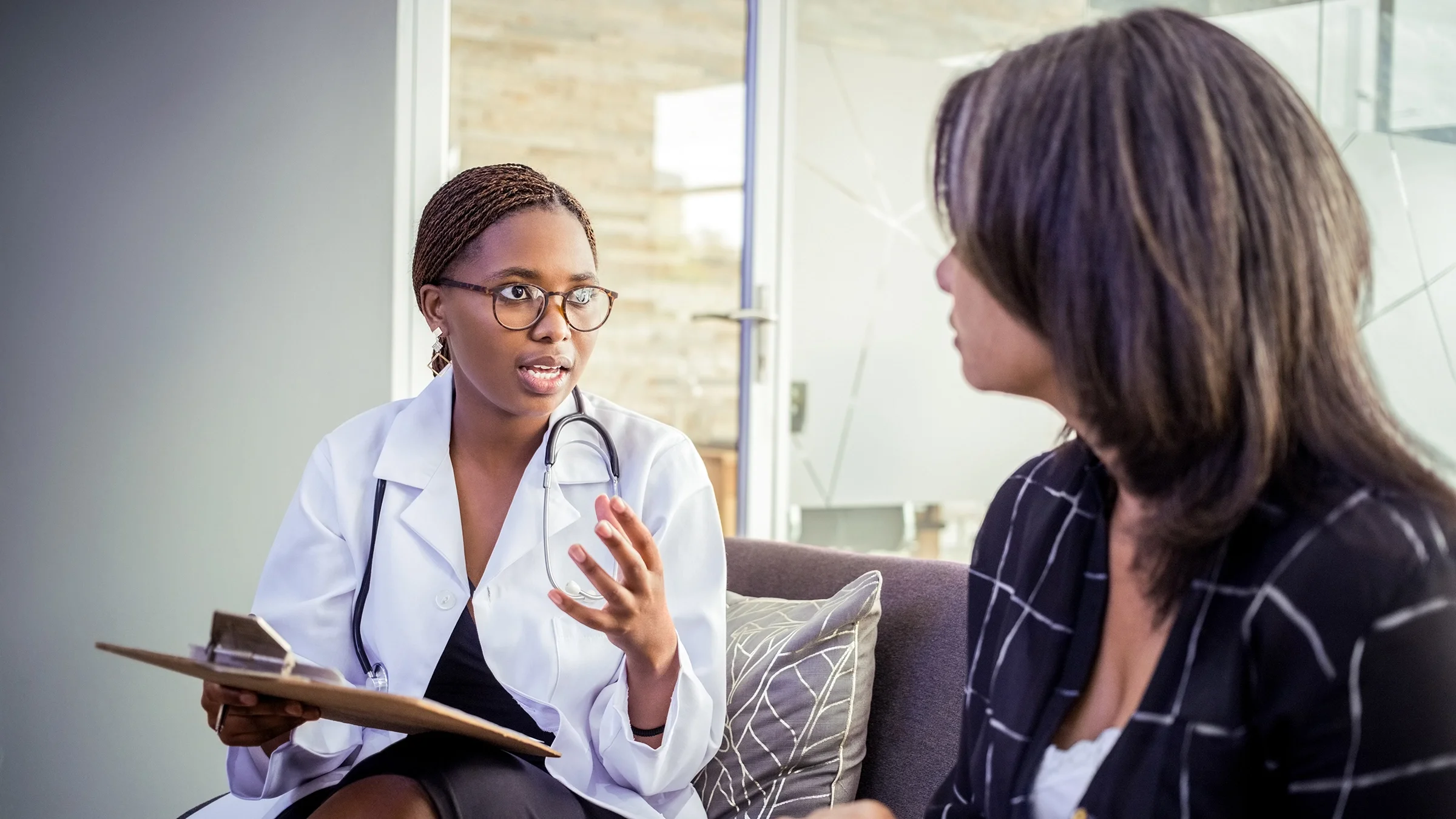Doctor reviewing information with a patient.