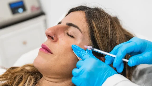 botox-cosmetic: woman receiving botox injection 2246704519