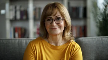 Health: Estrogen replacement: portrait older woman on couch 1299493615