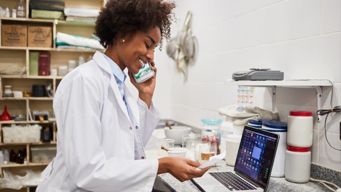 A pharmacist working in a lab.