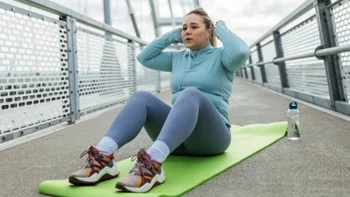 Movement Exercise: woman doing crunches 2157595241