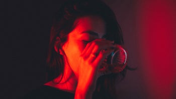 Health: Gynecology: portrait of woman drinking 1307941796