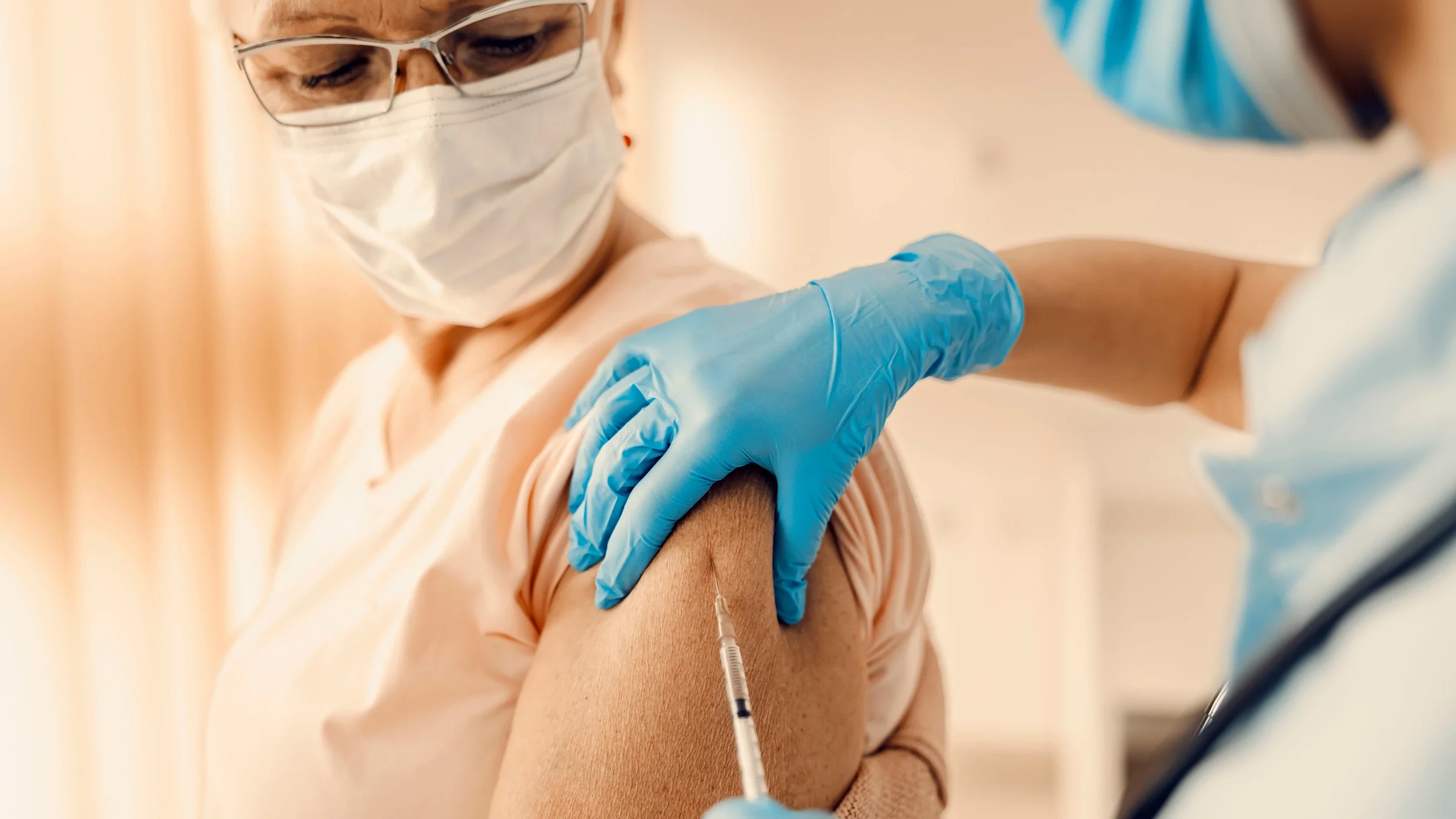 A person getting vaccinated.