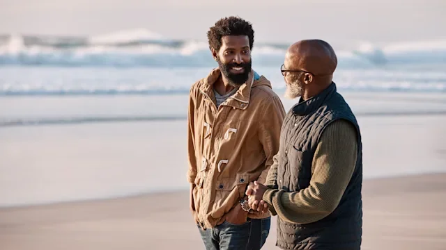 Health: Alcohol use disorder: adult son and father walking on beach-1201593827