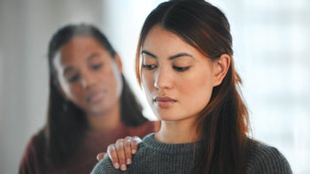 Bipolar disorder: Women: supporting friend hand on shoulder 1389986849