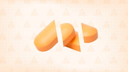 Light orange background with halftone texture and warning sign pattern. In the center are two oblong orange pills cut into thirds. 
GoodRx Health