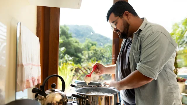 diet-nutrition: man stovetop cooking 1607728705
