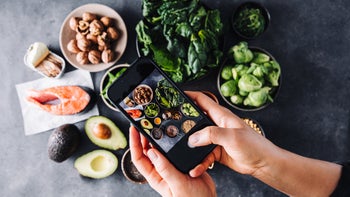 Health: High cholesterol: overhead view taking photo of food 1387721584
