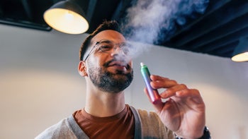 Vaping: man smoking vape 1492801535