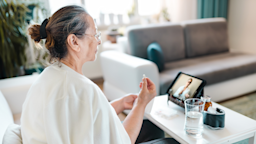 A senior woman has a telehealth appointment on her tablet.
Kemal Yildirim/E+ via Getty Images