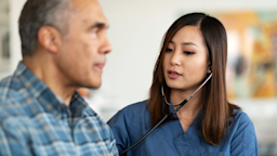 A doctor uses a stethoscope on a patient.
FatCamera/E+ via Getty Images 