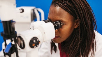 Eye: Optometrist vs. Ophthalmologist: Ophthalmologist examining-1297105014