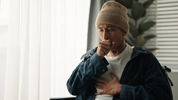 Cold: man with cough and chest pain 2152773277