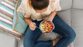 Health: Diet and nutrition: woman oatmeal fruit 641777092