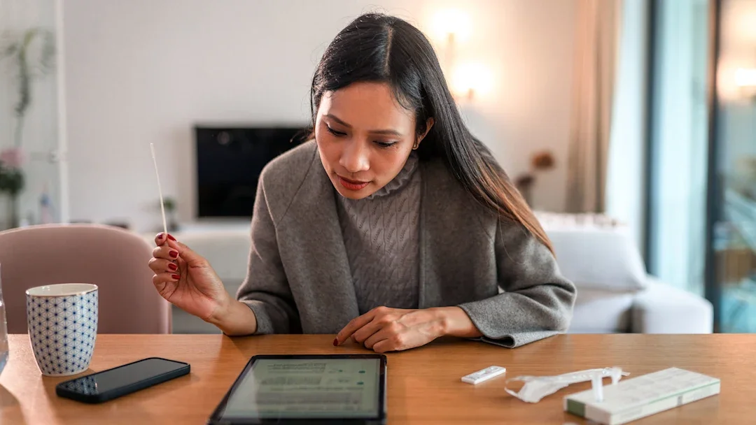 COVID-19: Cold: woman at home covid test 1345296785