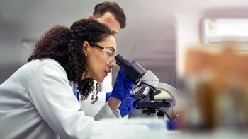 Peptides: researcher testing under a microscope 1530975485