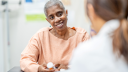Woman speaking to a healthcare professional about medication
FatCamera/E+ via Getty Images