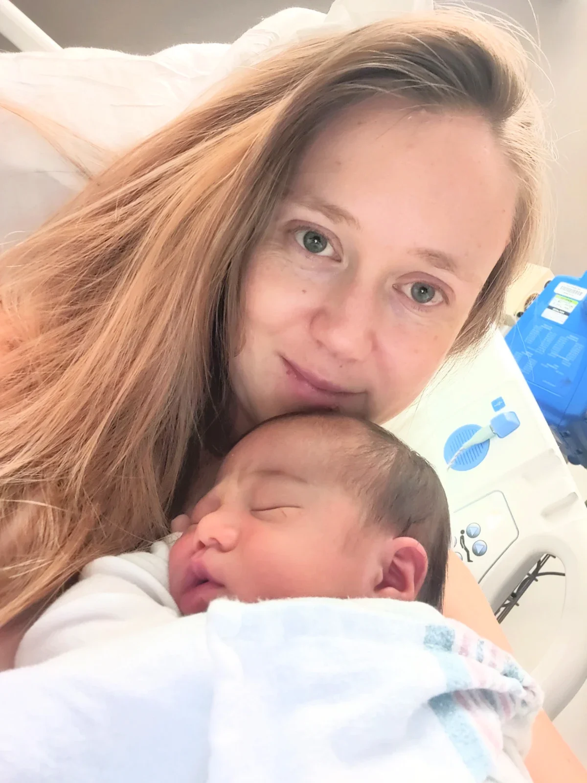 Clare Hennig in the hospital with her newborn son. 