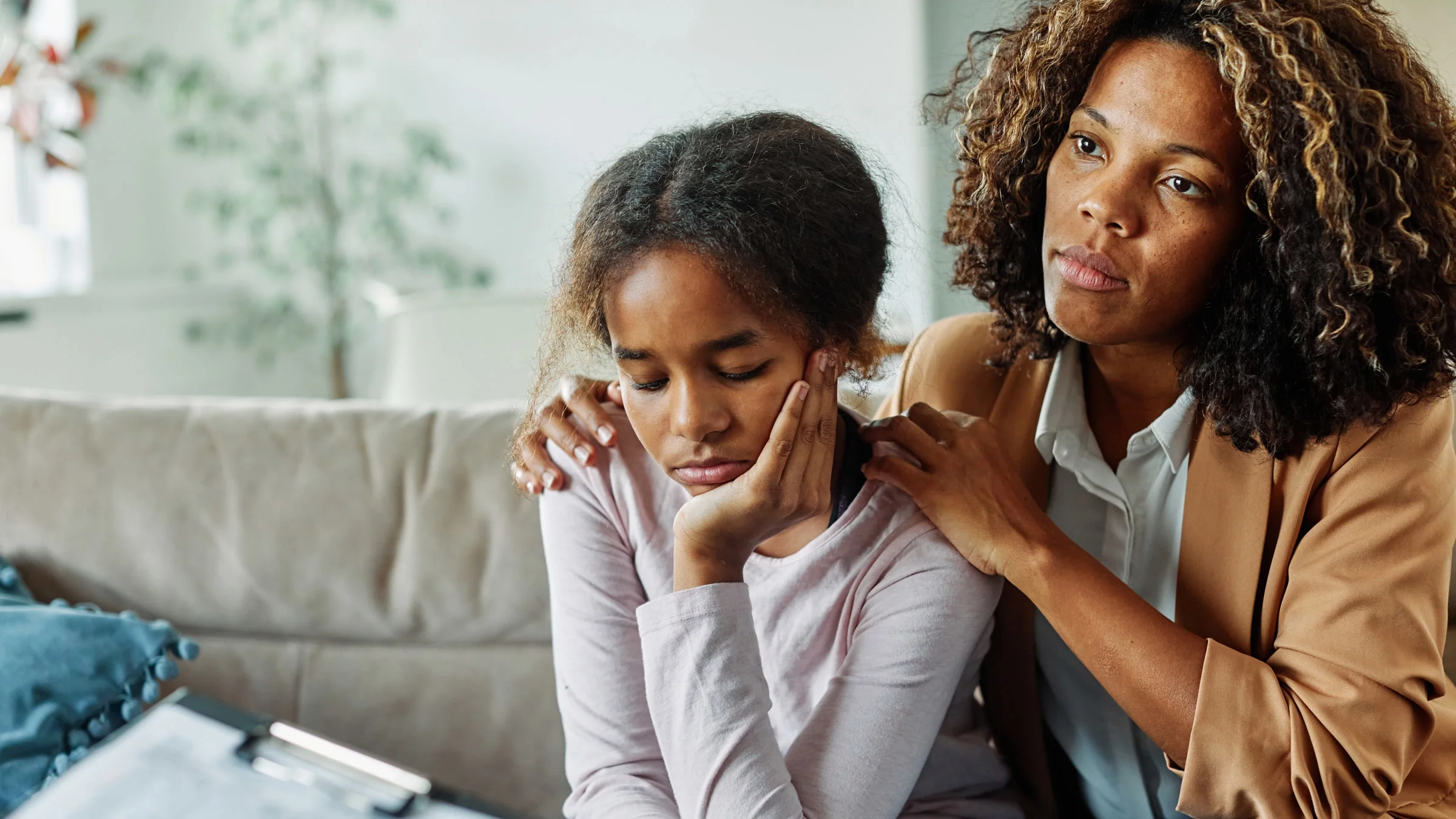 A parent and child in a therapy session.