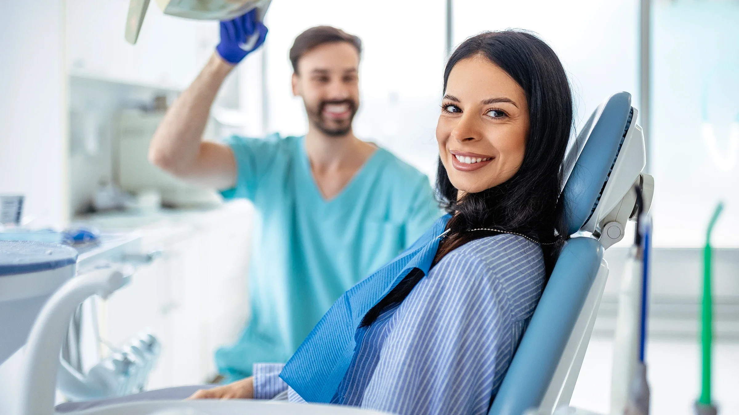 A patient sits in a dental chair.
Zorica Nastasic/E+ via Getty Images  